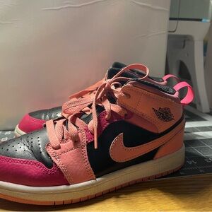 Pink and Black Air Jordan 1 Mid Sneakers